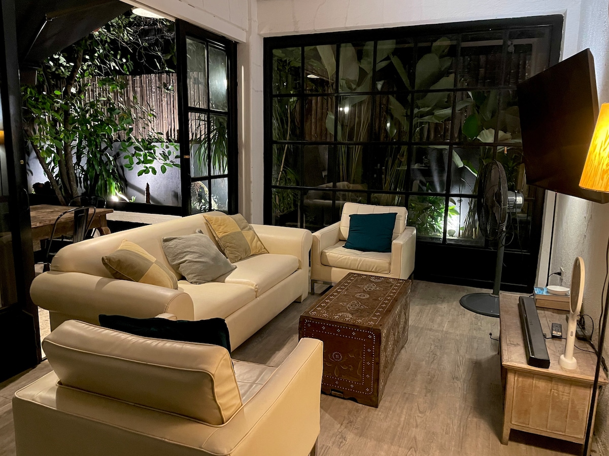 Casa Uno living room at night